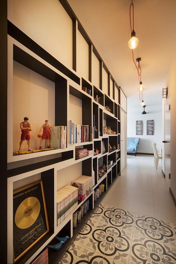 book storage and display area along a corridor. Clever storage solutions